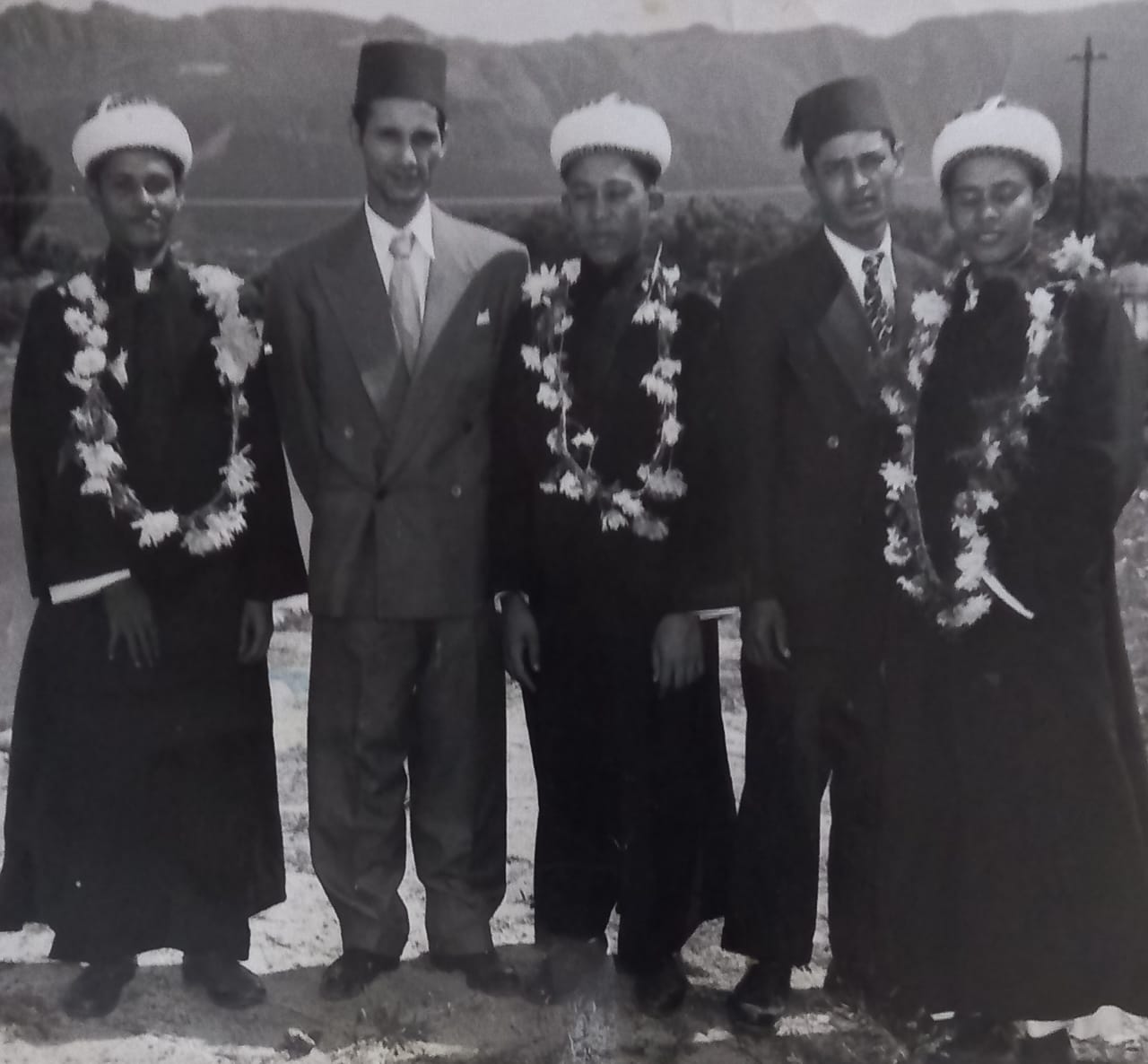 The Solomon brothers garlanded on their return
